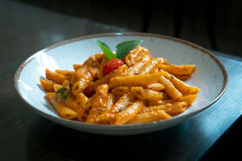 delicious penne pasta with tomato basil sauce